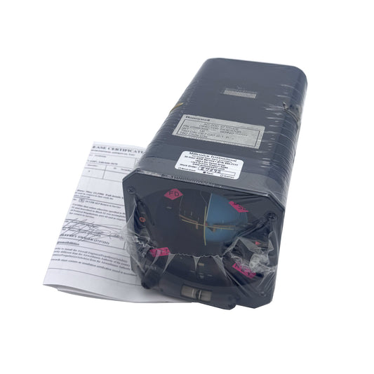 Honeywell AD-200 Attitude Director Indicator (PN 2588369-905) angled view with FAA 8130 certification tag and paperwork