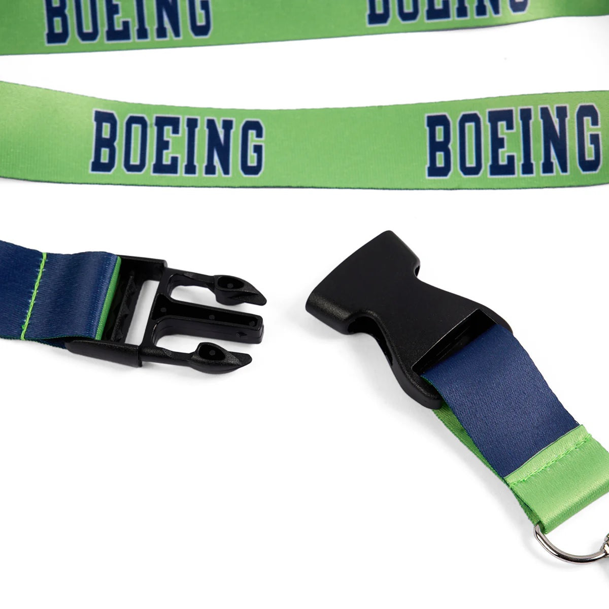 Close-up of Boeing varsity lime green lanyard quick-release buckle and key clip