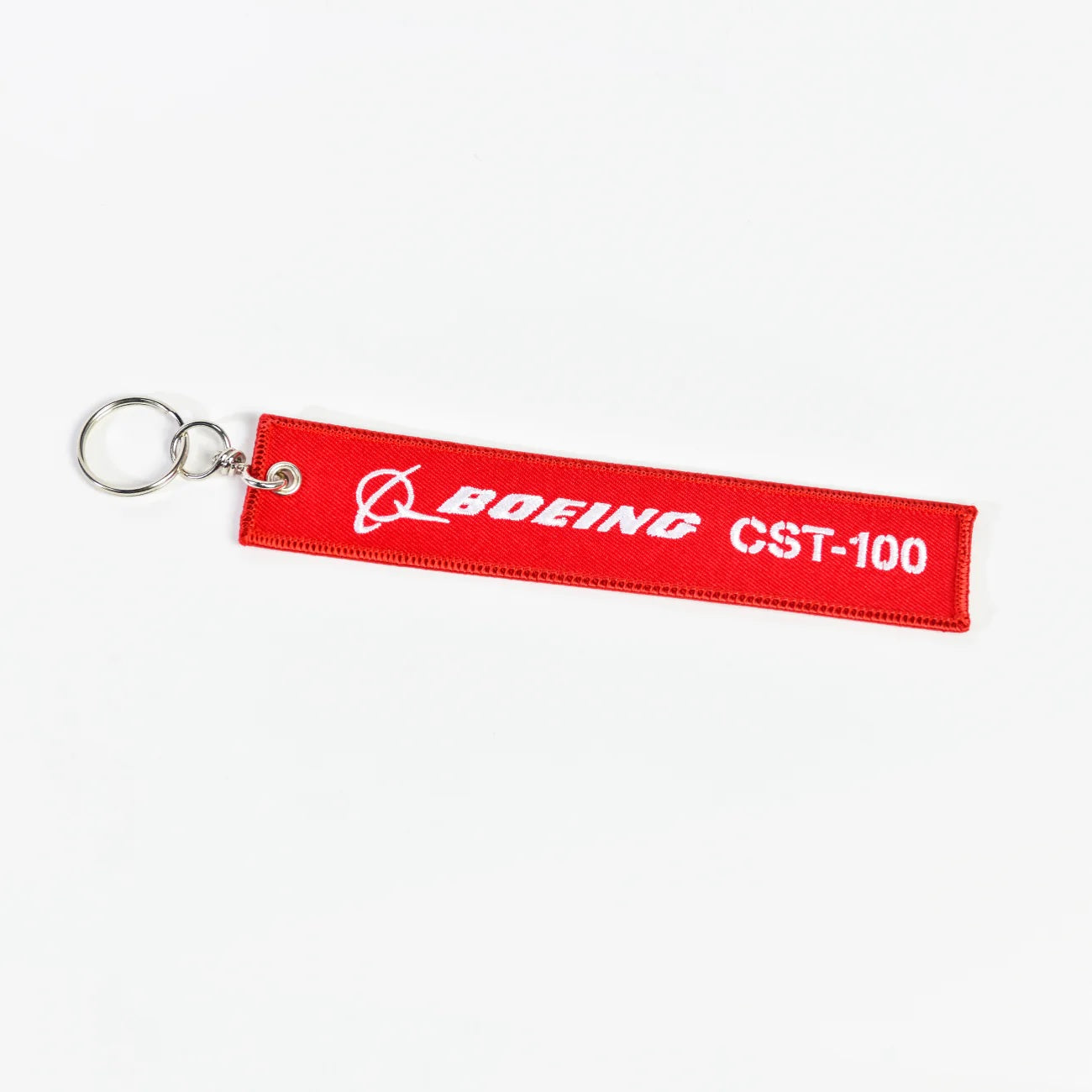 Boeing CST-100 Remove Before Launch red embroidered keychain with metal keyring