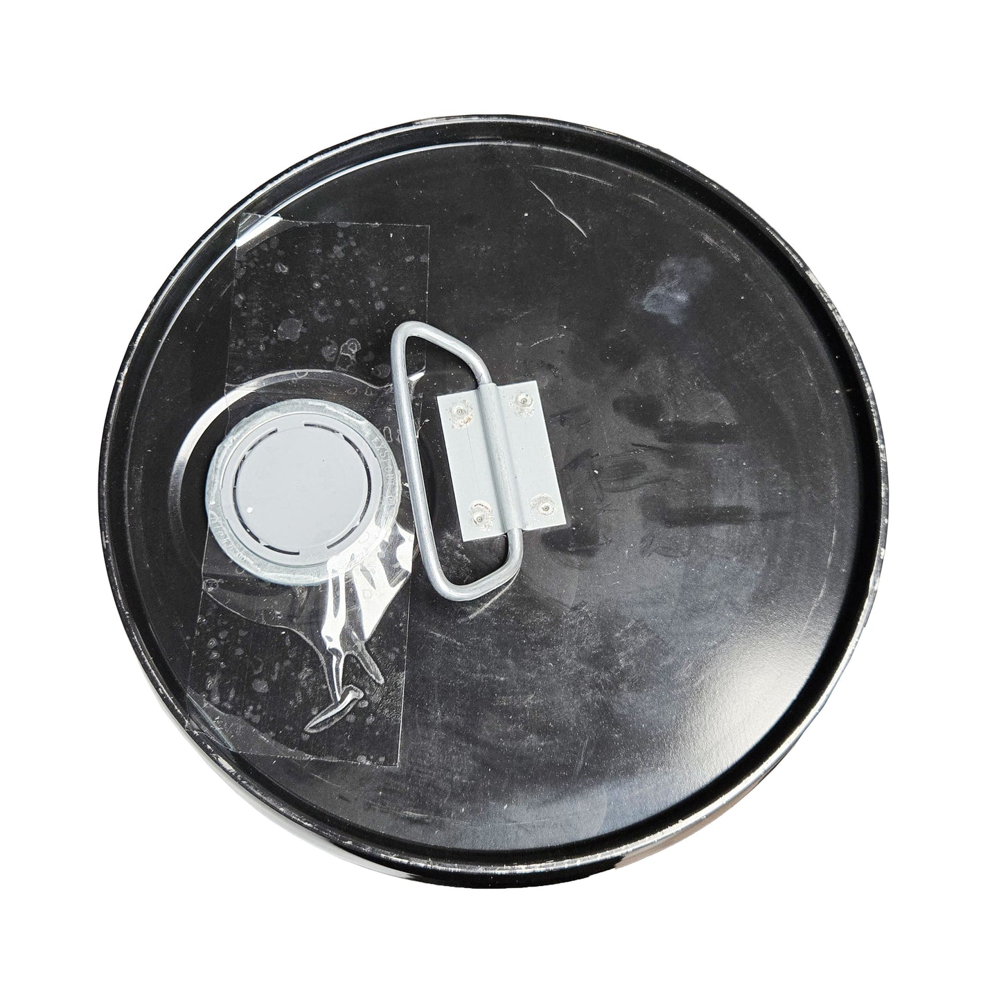 Top-down view of Castrol Brayco Micronic 889 coolant fluid 5-gallon black metal drum showing lid handle and sealed fill cap.