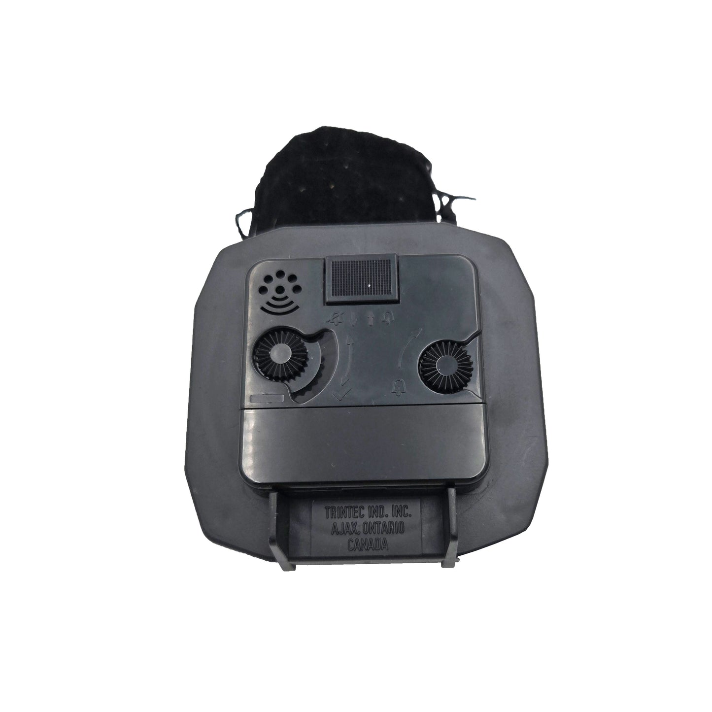 Rear view of Trintec DM65 desk alarm clock showing time and alarm adjustment knobs, on-off switch, speaker grille, and battery compartment