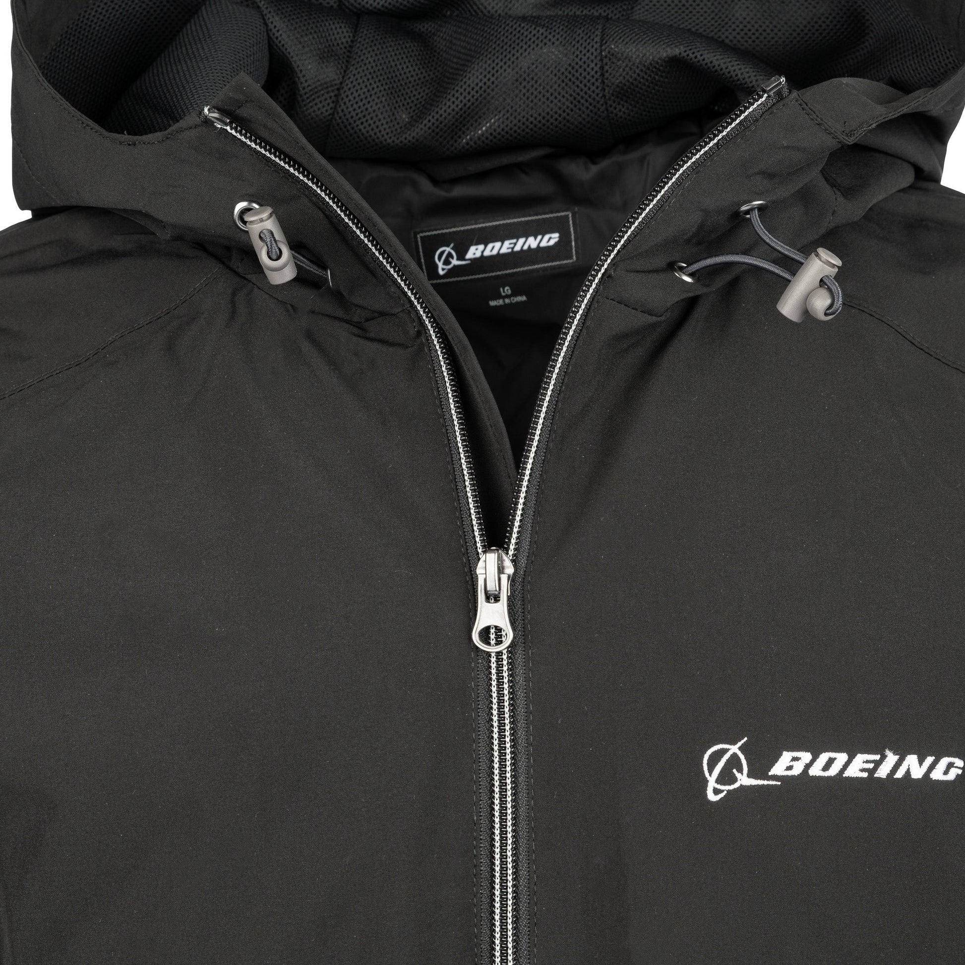 Close-up of black Boeing Newport jacket hood and front zipper detail