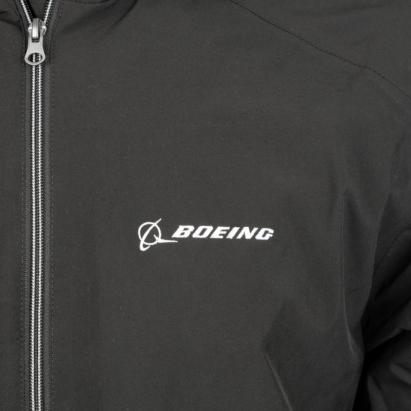 Close-up of embroidered Boeing logo on black Newport jacket chest