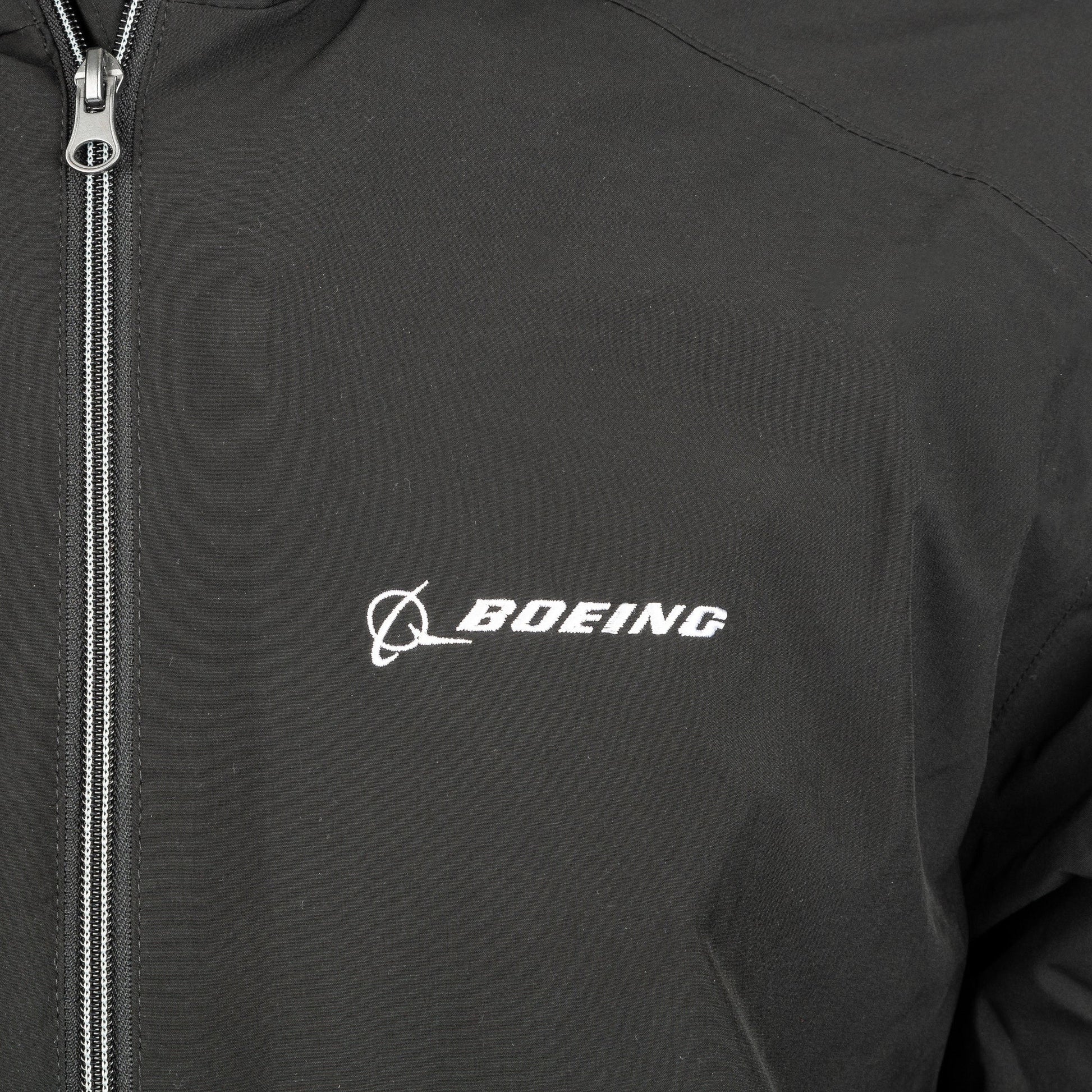 Close-up of embroidered Boeing logo on black Newport jacket chest