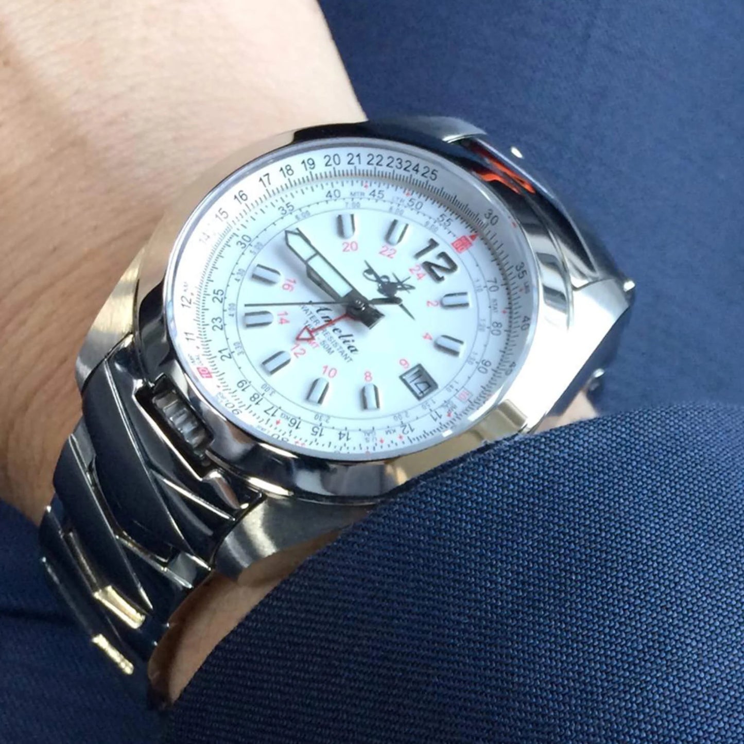 Amelia Women's Pilot Watch with Cloud White Dial and Stainless Steel Band, Worn on Wrist, Featuring GMT Function and Flight Calculator by Abingdon Co.