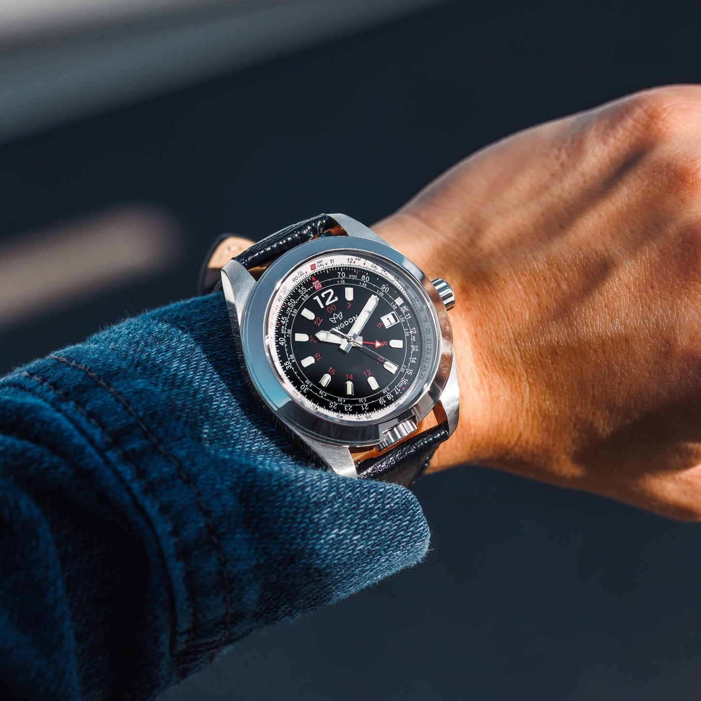 Amelia Women’s Aviation Watch with Runway Black Dial, Black Leather Strap, and Flight Computer Bezel on Wrist – Abingdon Co.