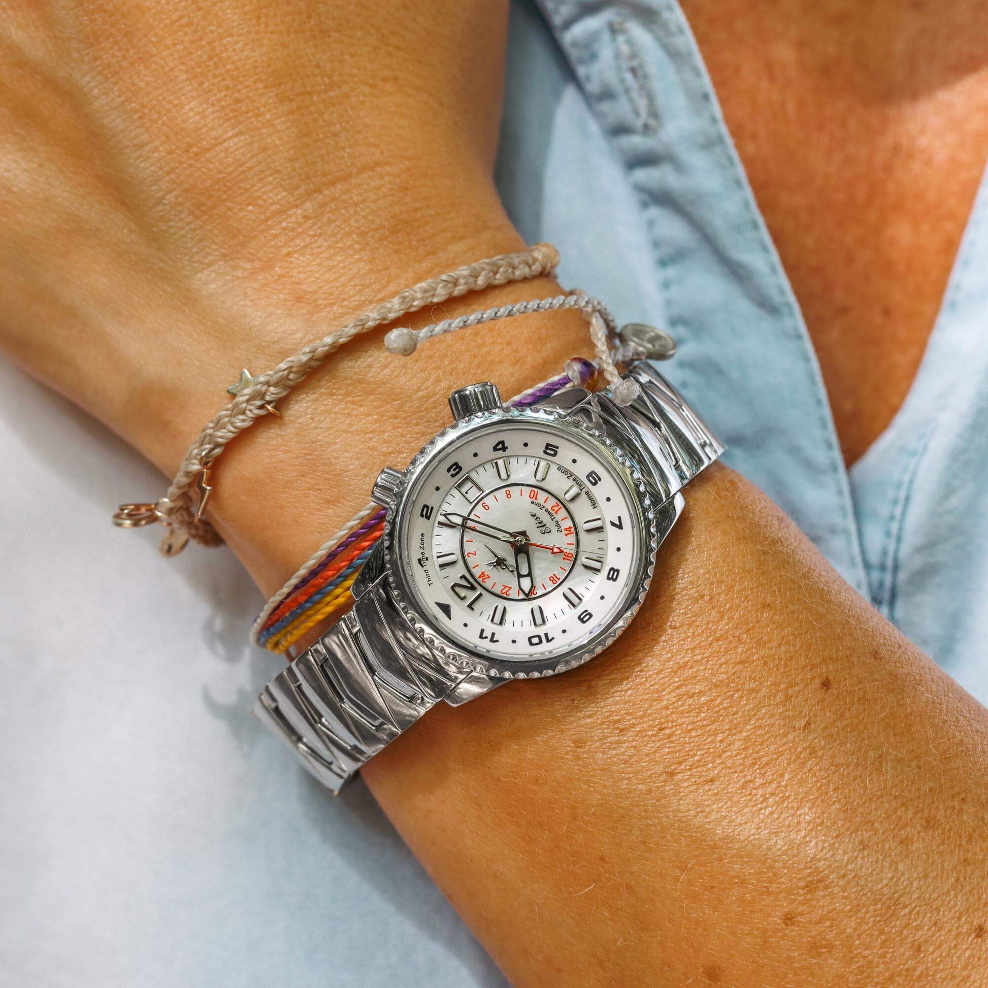 Elise GMT Travel Athenian Silver Watch on Woman’s Wrist with Mother-of-Pearl Dial