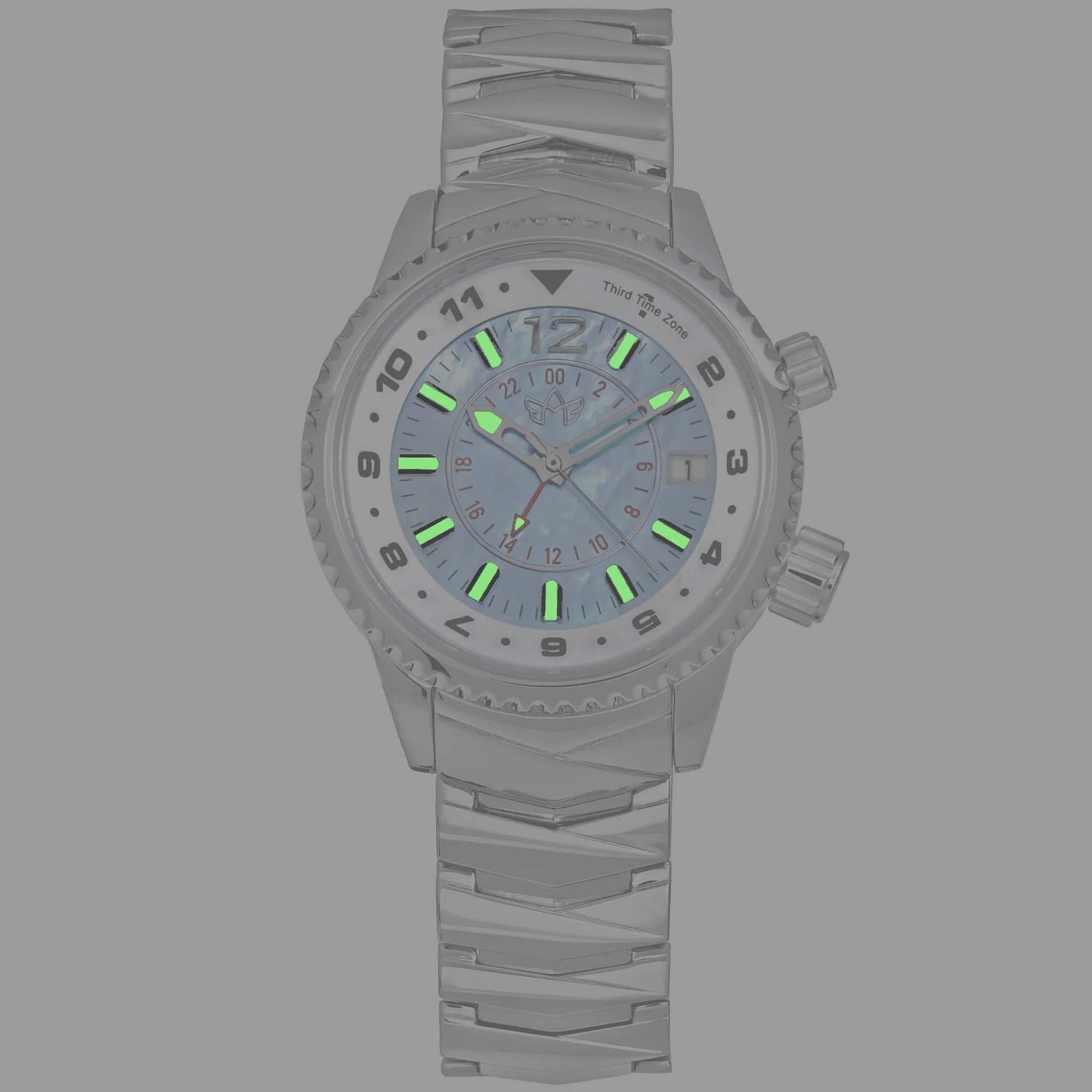 Glow-in-the-dark view of Elise North Star Sky Blue watch highlighting Super-Luminova hands and markers.