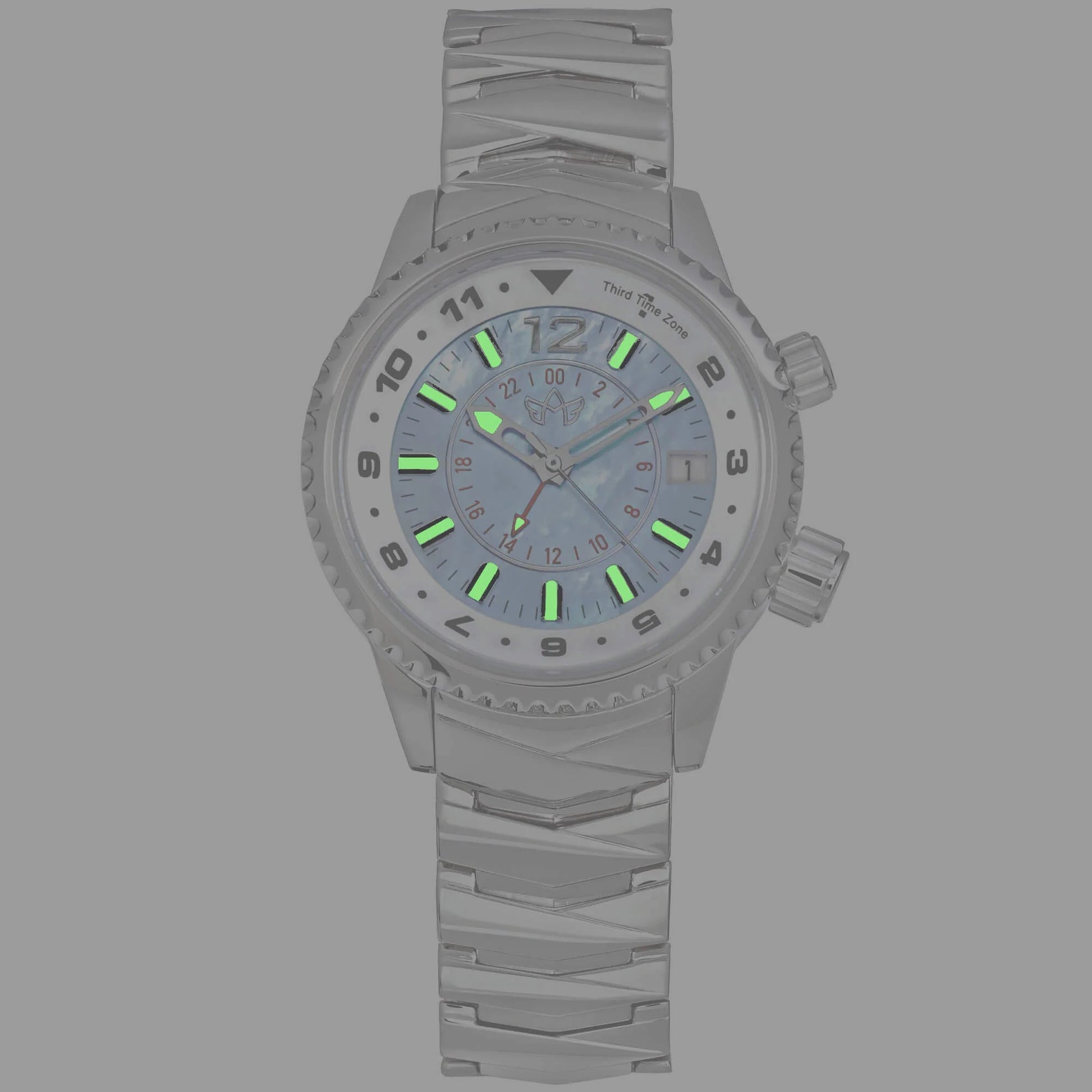 Glow-in-the-dark view of Elise North Star Sky Blue watch highlighting Super-Luminova hands and markers.