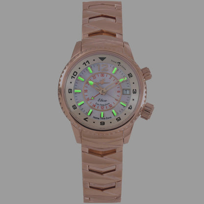 Elise Rosy watch in low light showing green and blue luminescent hour markers and hands.