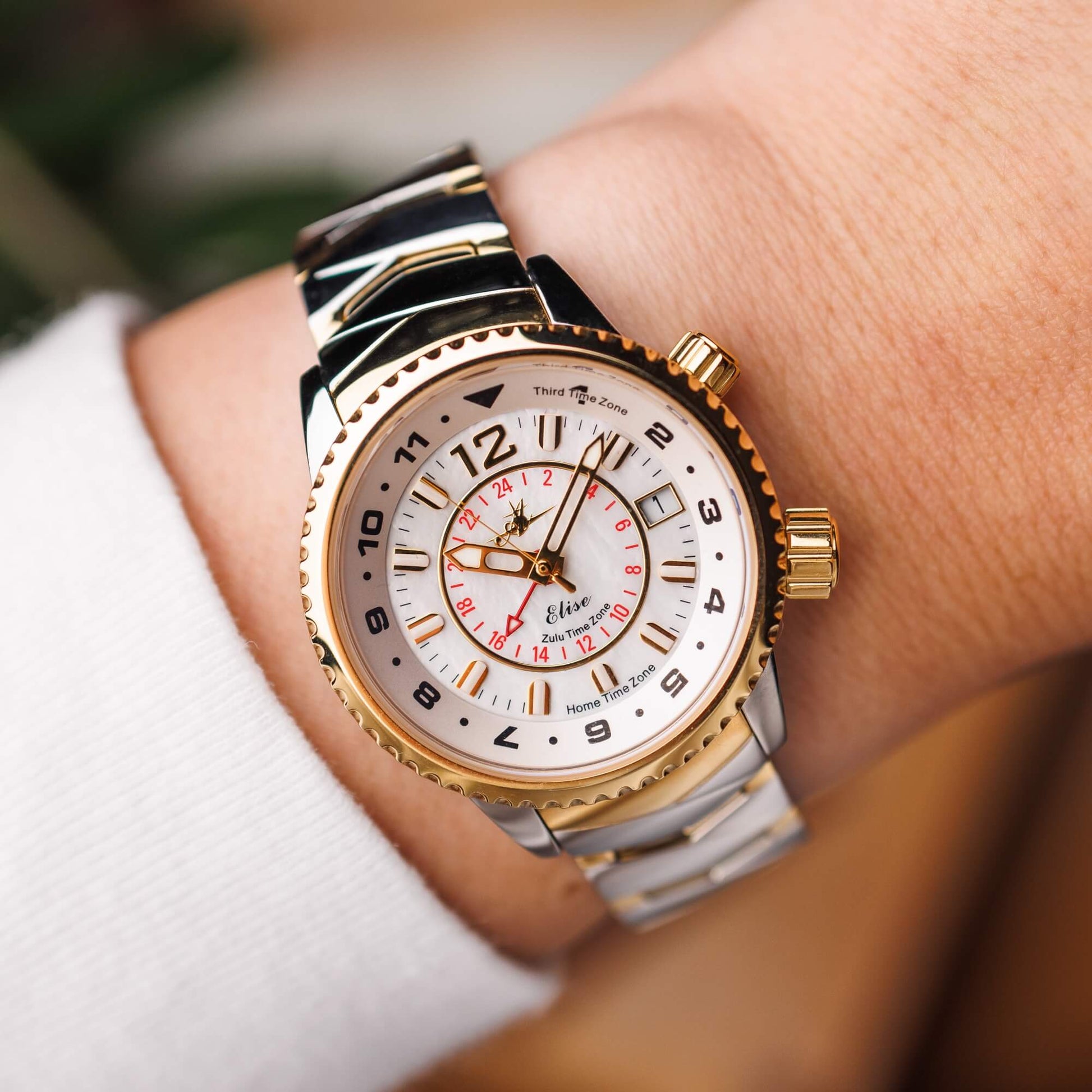 Elise Two-Tone Watch on Wrist – White Dial with Red Accents and Dual-Finish Bracelet
