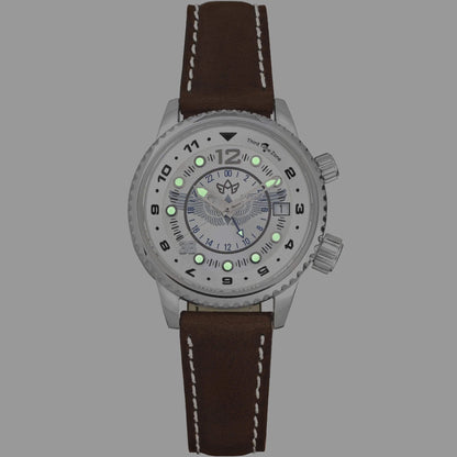 WASP Silver Limited Edition GMT Watch with Super‑Luminova Hands and Markers Glowing on Mother-of-Pearl Dial in Low Light