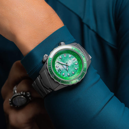 Marina Women's Dive Watch in Caribbean Green Shown on Wrist with Titanium Bracelet and Luminous Mother-of-Pearl Dial