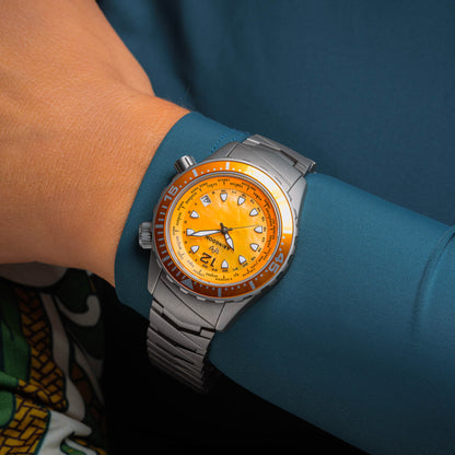 Marina Women's Dive Watch in Yellow Snapper Shown on Wrist with Titanium Bracelet and Bold Yellow Mother-of-Pearl Dial