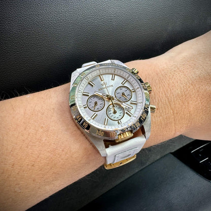 Jordan Women’s Pilot Watch with Champagne Dial, Gold and Silver Case, White Leather Band, Shown on Wrist with Chronograph and Tachymeter Bezel