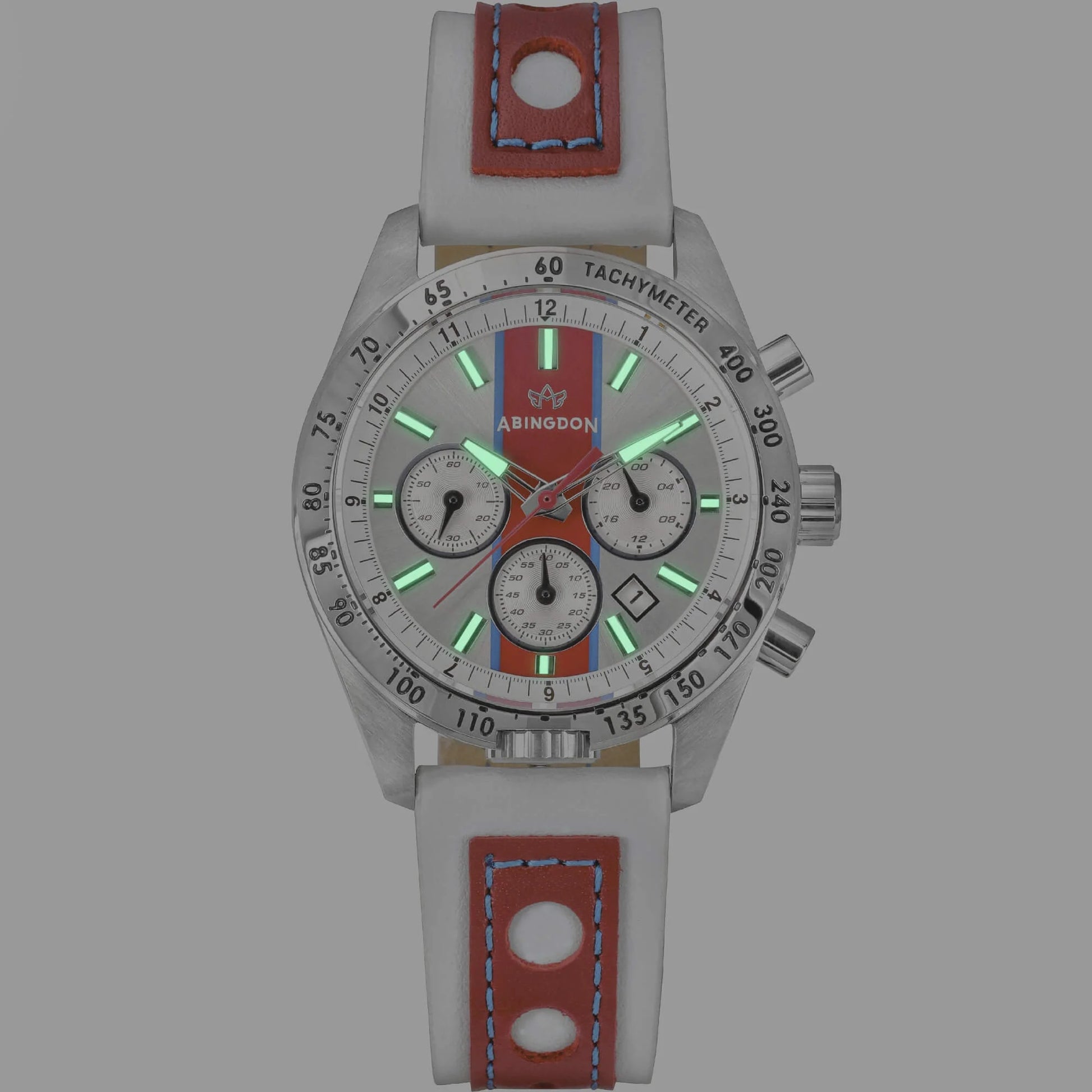 Jordan Women’s Pilot Watch with Victory Red Dial and White Leather Strap, Shown Glowing with Super-Luminova Hands and Hour Markers in Low Light