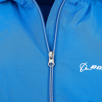 Close-up of royal blue Boeing Newport Jacket zipper and embroidered chest logo