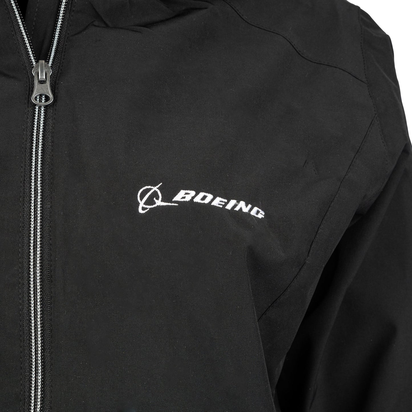Detail view of black Ladies Boeing jacket embroidered Boeing logo on chest