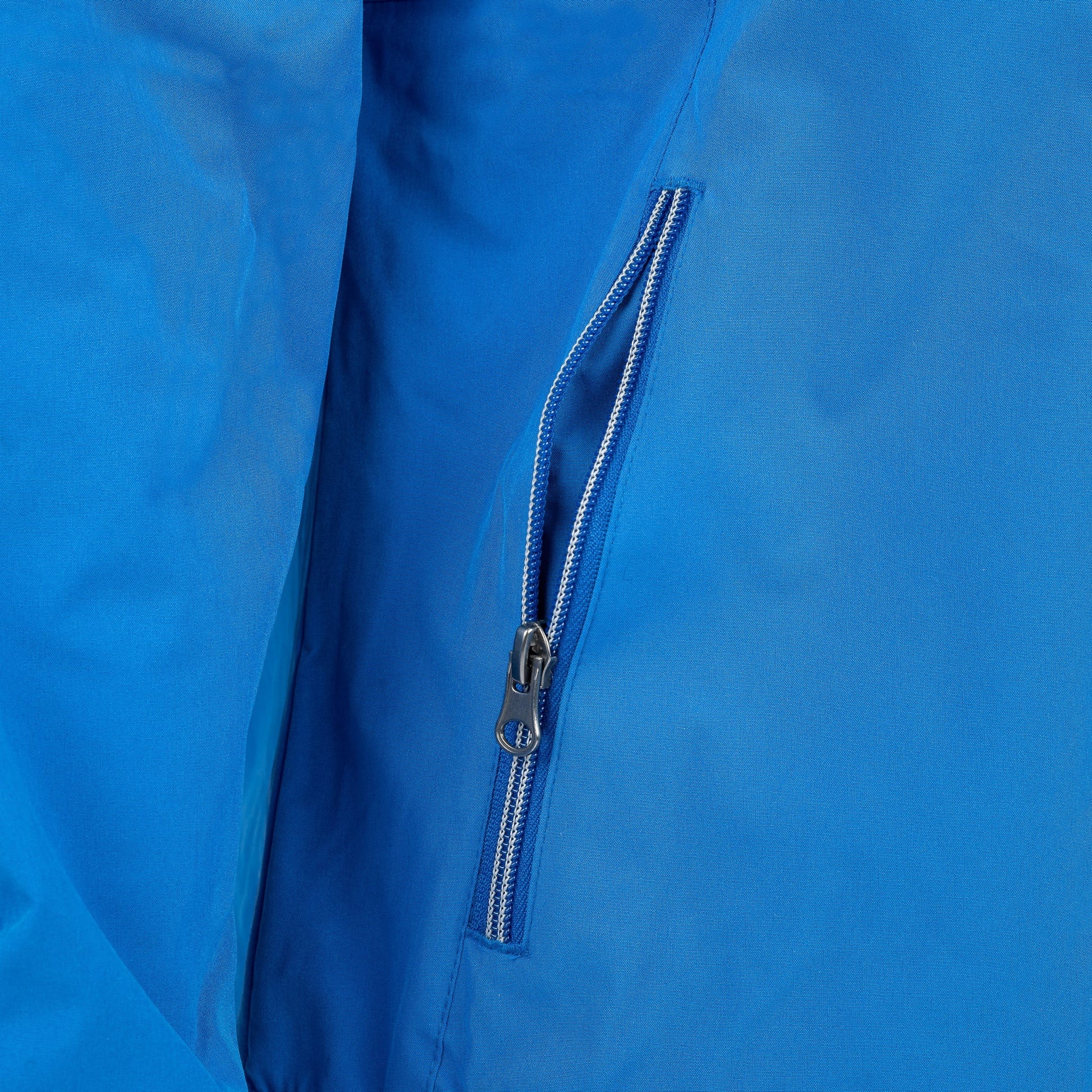 Close-up of royal blue Boeing Newport Jacket zippered side pocket