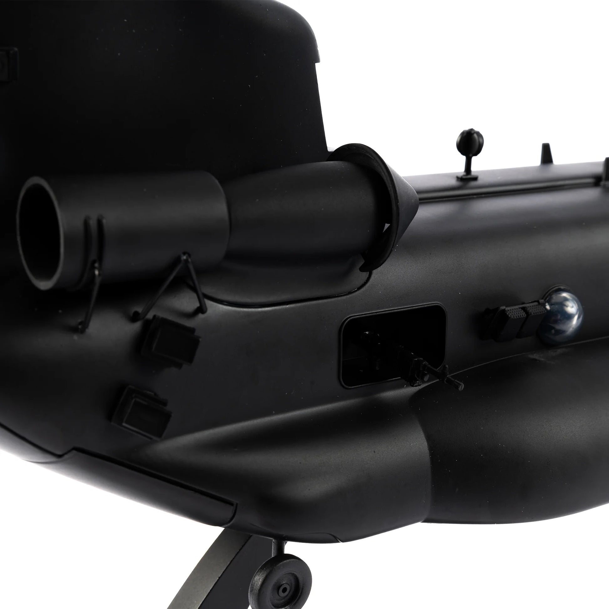 “Close-up of MH-47 Chinook rotor and mission equipment details”