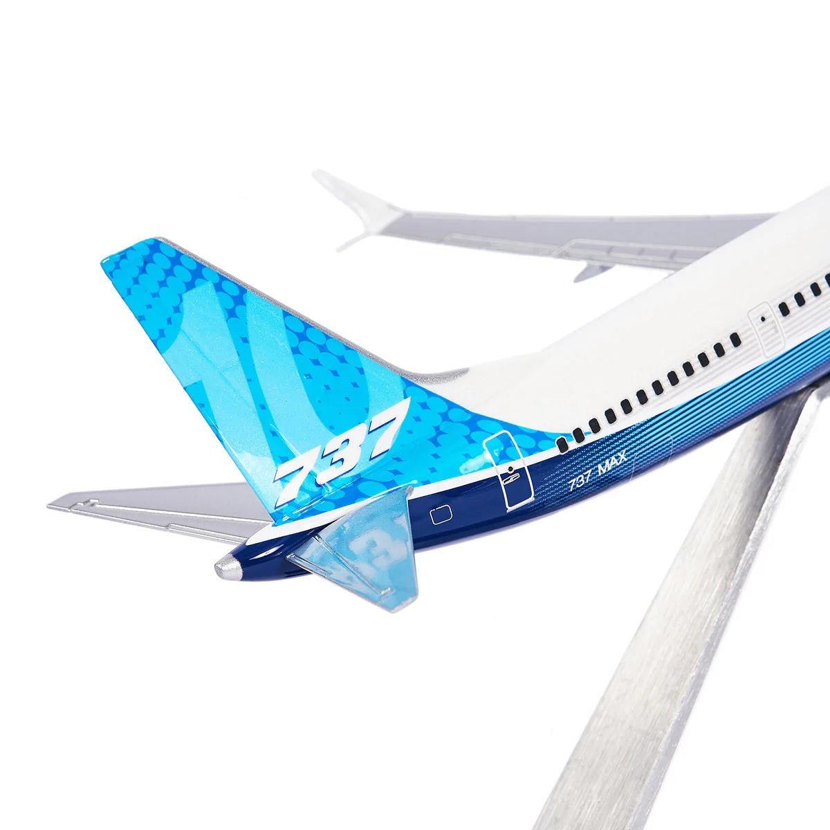 “Rear angle view of Boeing 737 MAX 10 model showing wings and tail”