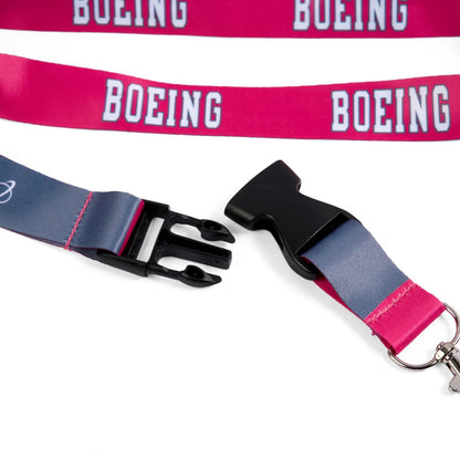 Close-up of Boeing varsity pink lanyard quick-release buckle and key clip