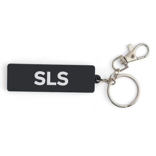 Boeing Space Launch System Series keychain with SLS lettering and silver key ring clasp