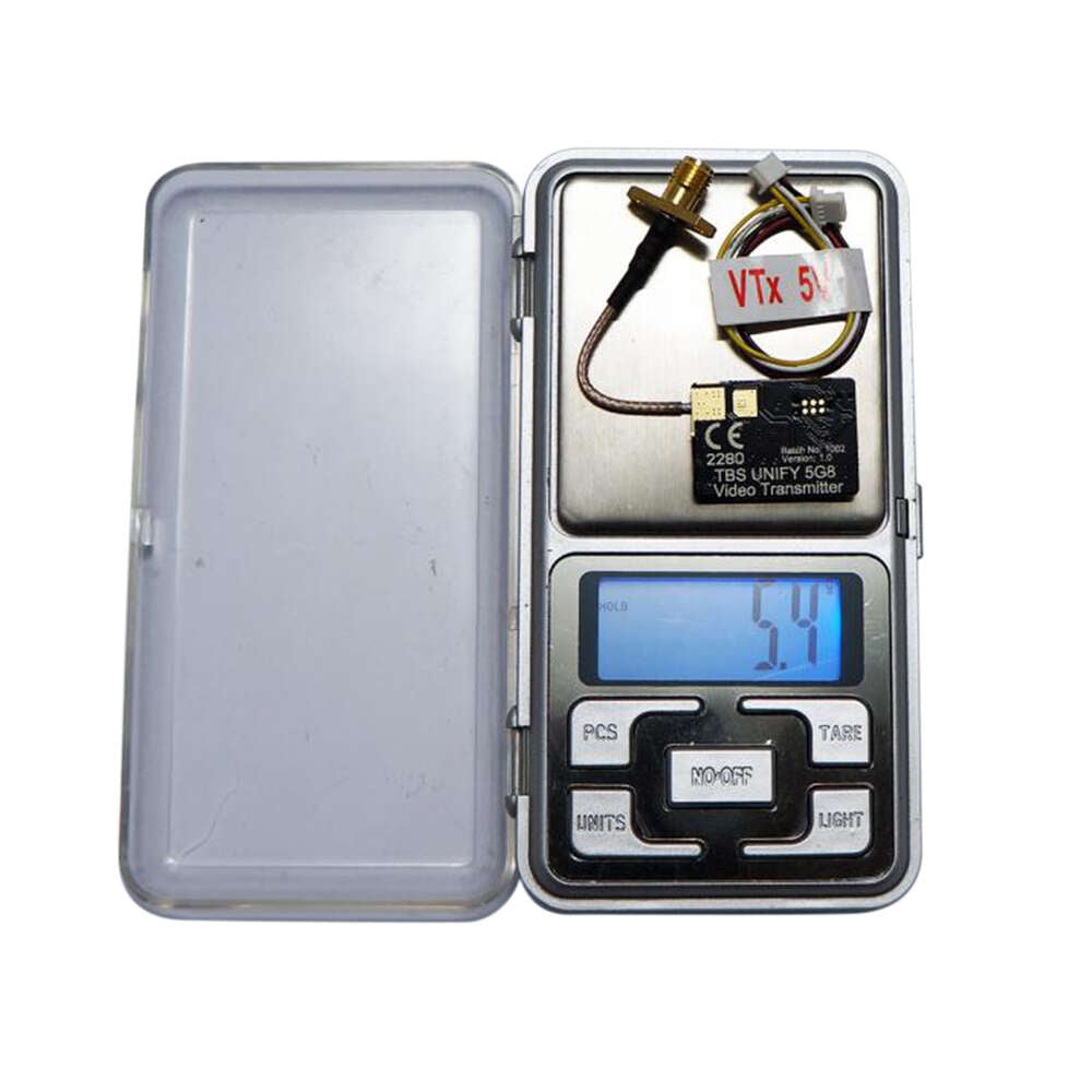 TBS UNIFY PRO 5G8 V3 video transmitter with RP-SMA connector weighing 5.4g on digital scale
