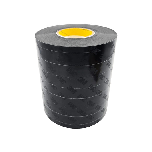 Full roll of 3M 8663 black polyurethane protective tape with yellow core, outer layer printed with 3M logo, on white background