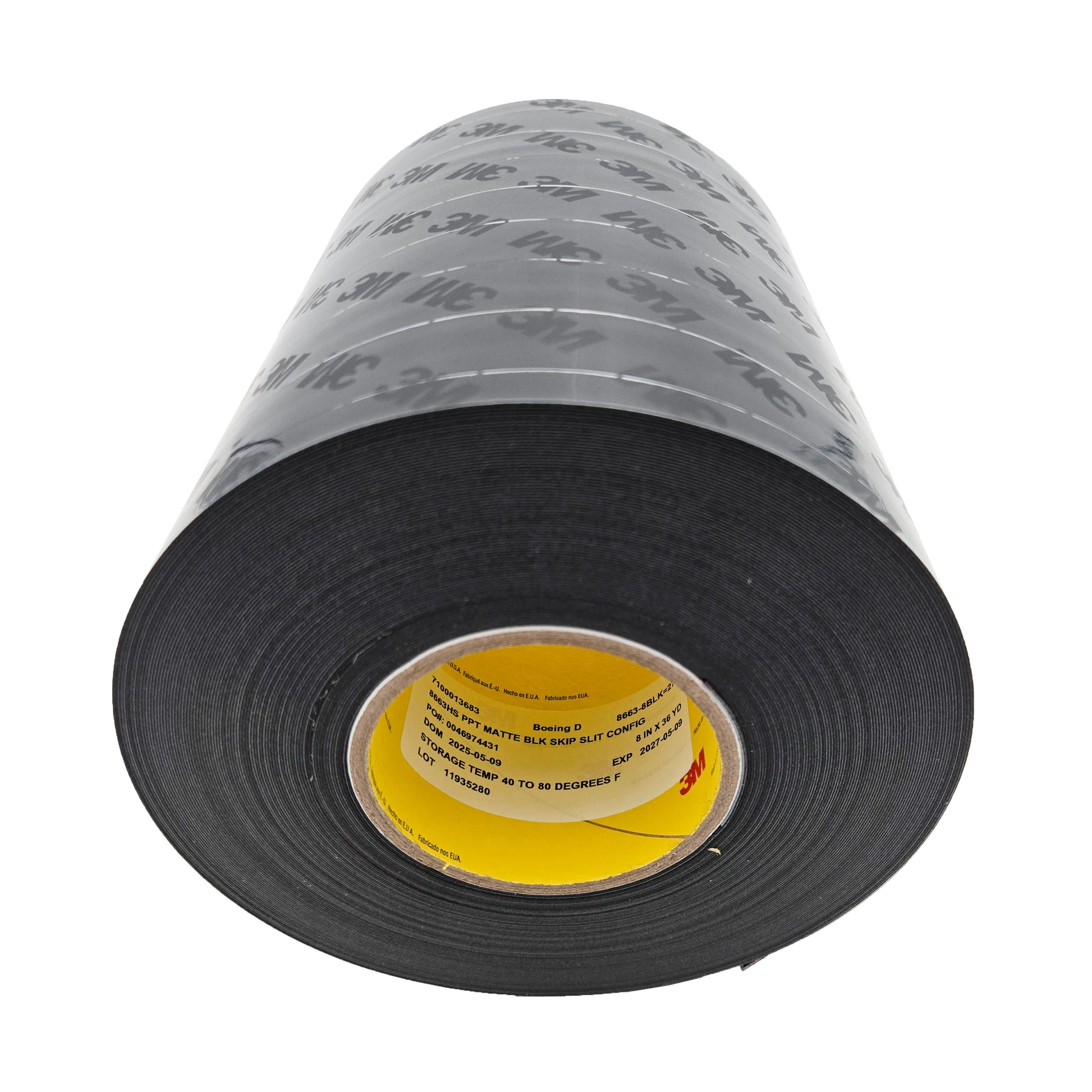 Low-angle view of 3M 8663-8BLK black polyurethane tape roll showing yellow core label with Boeing specification and storage details