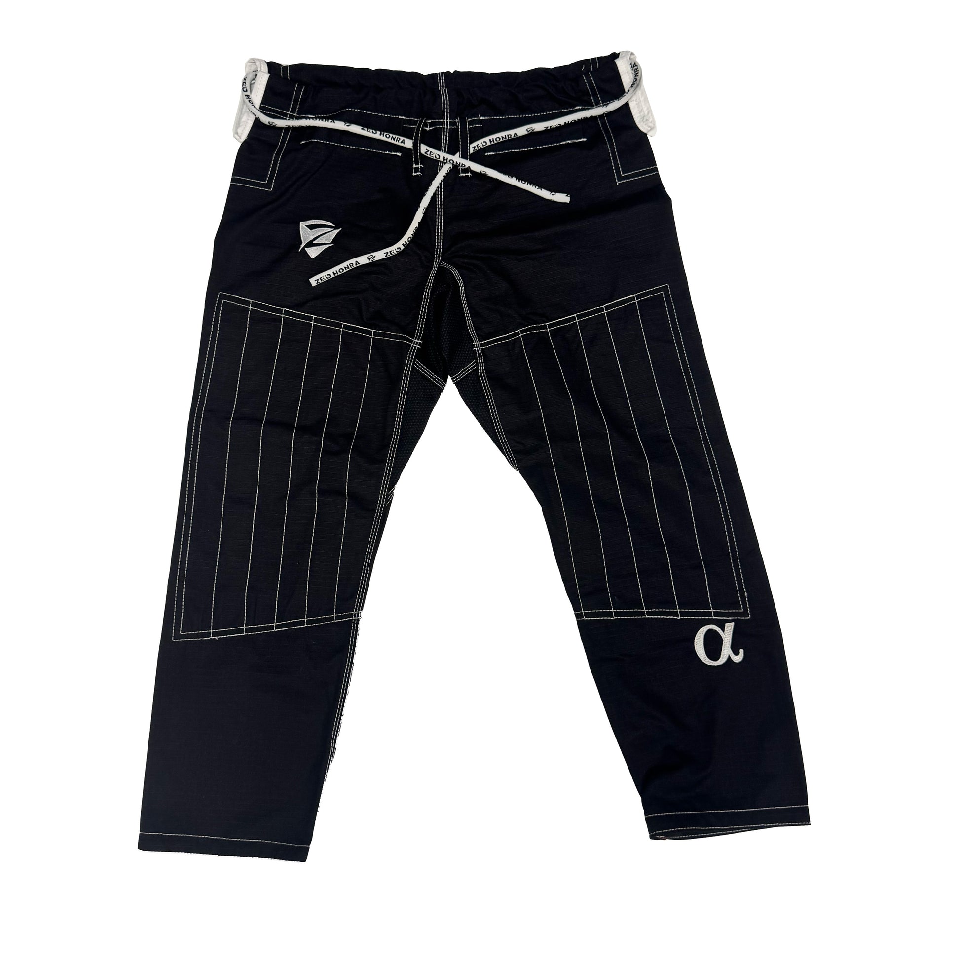 Black pants with white stitching on a white background