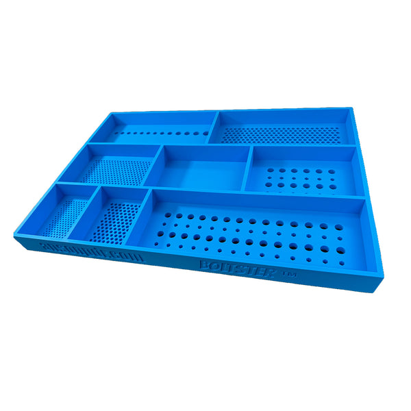 Boltster™ Top Box Tool Tray in blue silicone with five hole patterns, linear fastener rows, and a central catch-all section