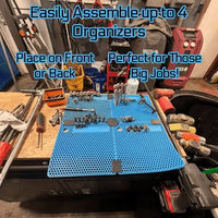 Boltster™ Modular System in use, connecting four organizers on a workbench and loaded with tools and fasteners for a large-scale project