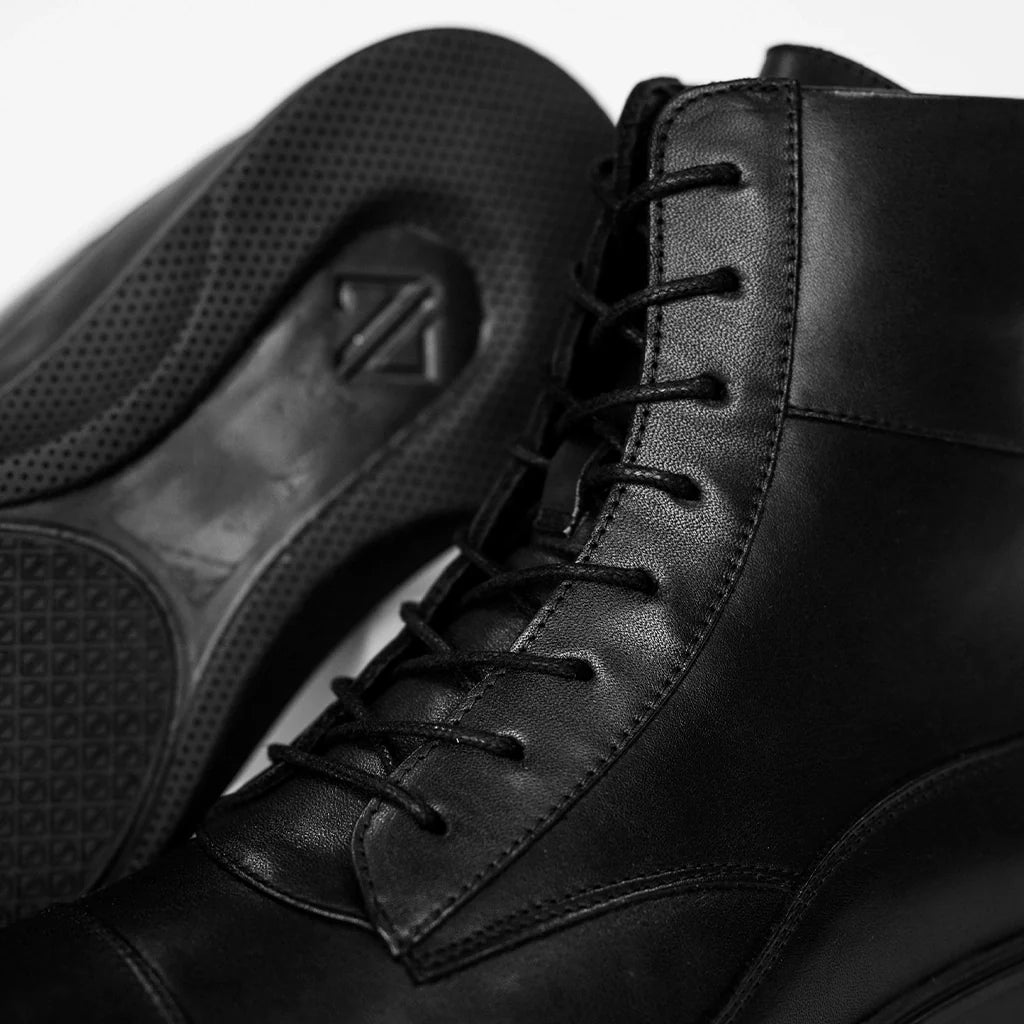 Amberjack The Boot Obsidian black pilot ankle boot, left side view, lace-up aviation boot | Closeup
