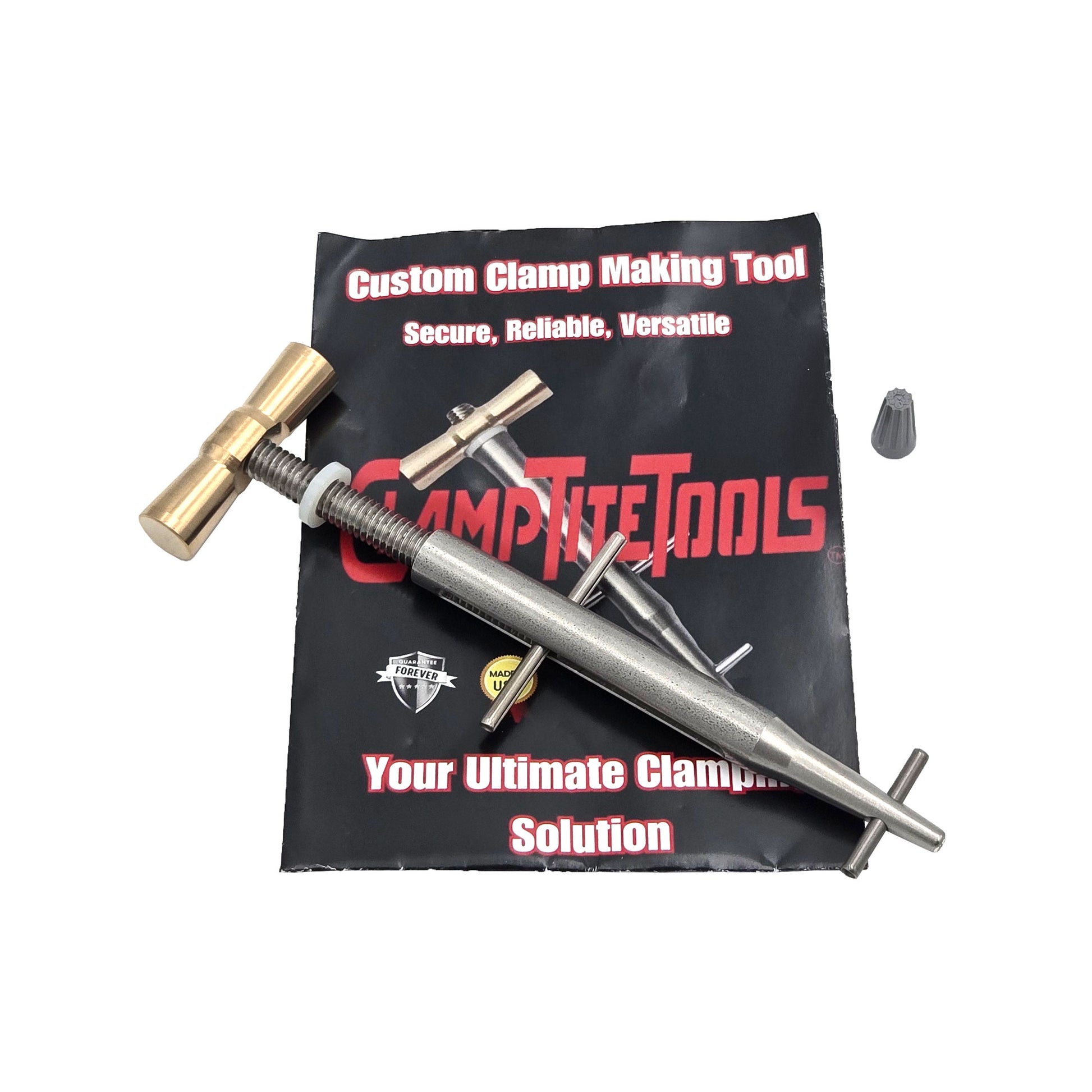 ClampTite stainless steel tool kit with bronze nut and accessories laid out on packaging with Custom Clamp Making Tool text