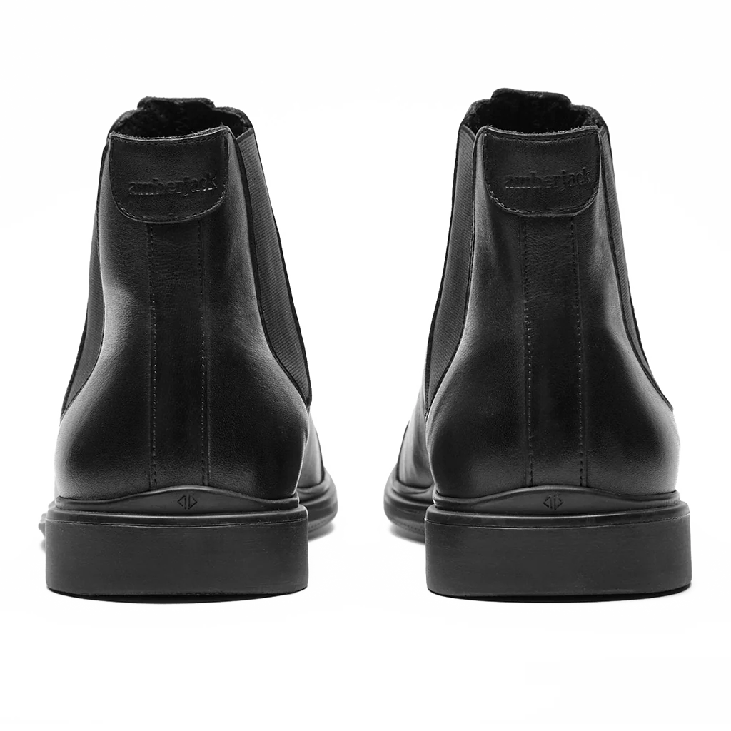 Amberjack Chelsea Obsidian black pilot boot, left side view, elastic side gore slip-on construction | Back Vew