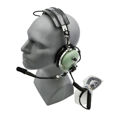 Angled view of David Clark H3432 ground support headset showing boom microphone positioned down and coiled communication cable attached