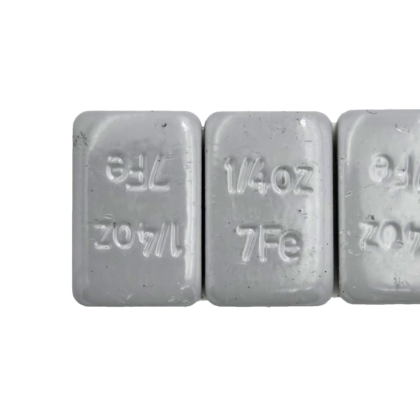 Close-up of Desser DTR9901 wheel balance weights highlighting individual 0.25 oz segments
