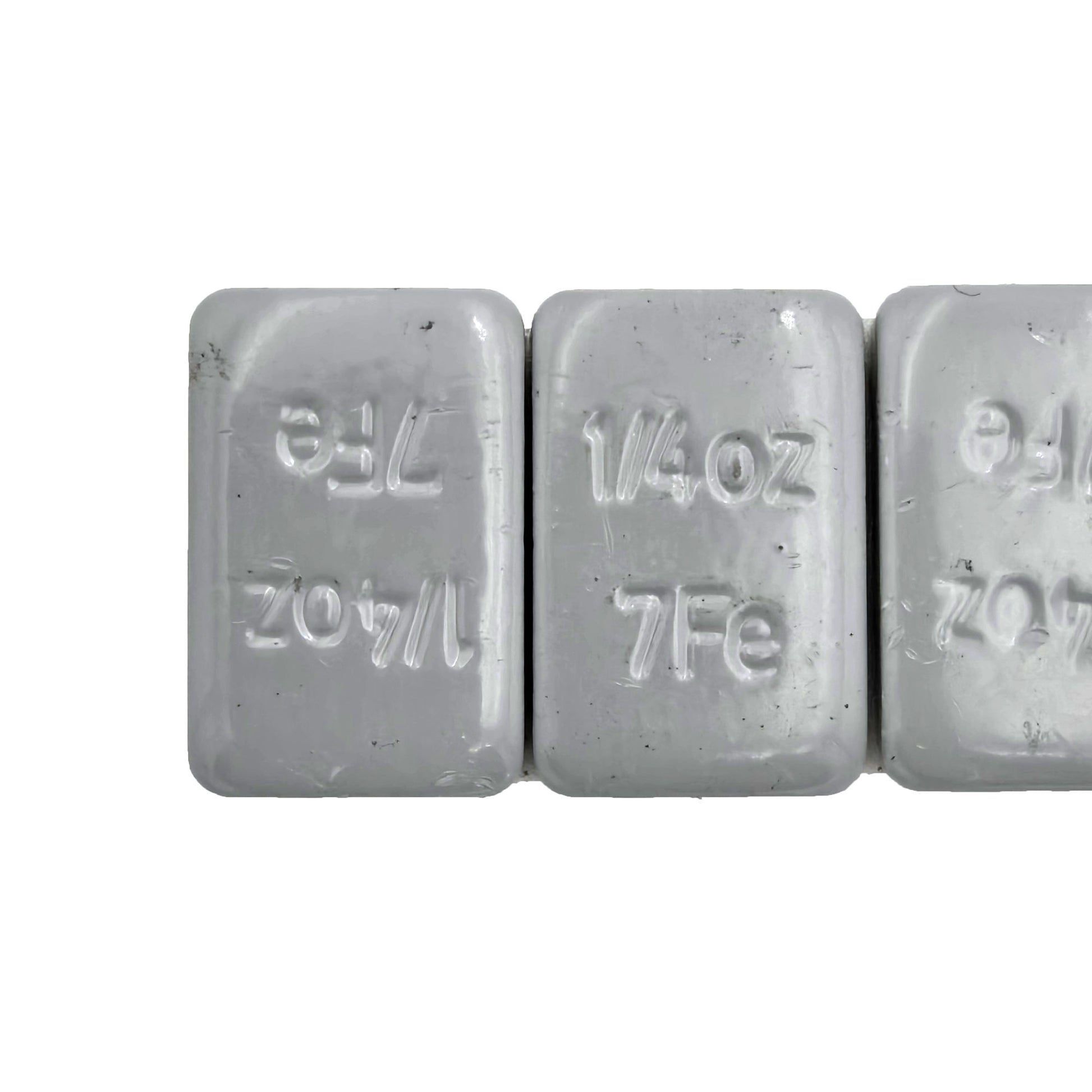 Close-up of Desser DTR9901 wheel balance weights highlighting individual 0.25 oz segments