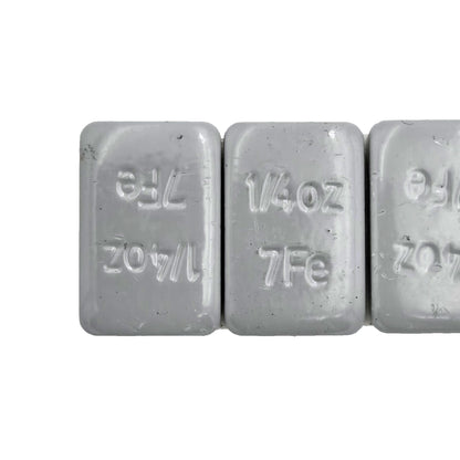 Close-up of Desser DTR9901 wheel balance weights highlighting individual 0.25 oz segments
