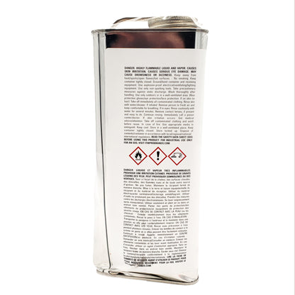 Side hazard label of Dykem opaque staining color showing highly flammable warning, serious eye damage caution, and GHS pictograms for industrial use.