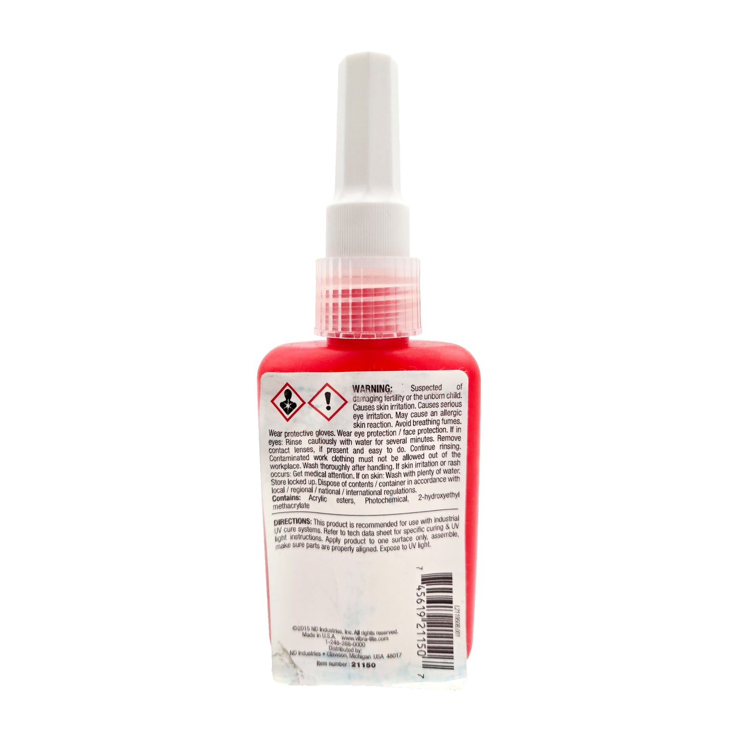 Back label of expired Vibra-Tite 211 UV adhesive showing GHS hazard pictograms, reproductive risk and irritation warnings, contents list, and usage directions