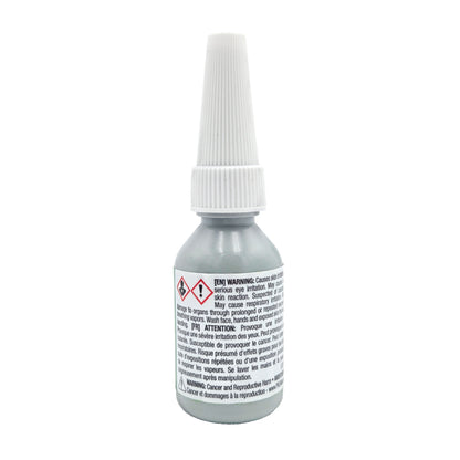 Side view of Vibra-Tite 530 bottle showing safety warnings, hazard pictogram, and Prop 65 notice.