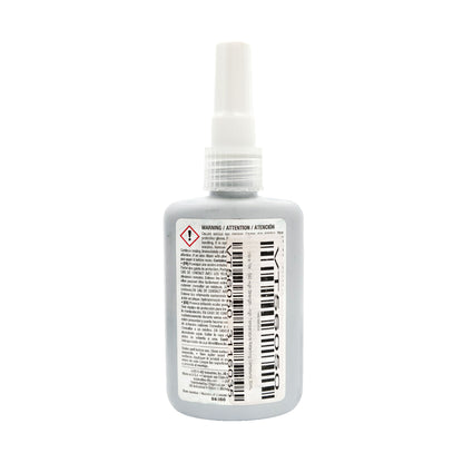Back of Vibra-Tite 560 bottle showing safety warnings, multilingual text, hazard symbol, and barcode.