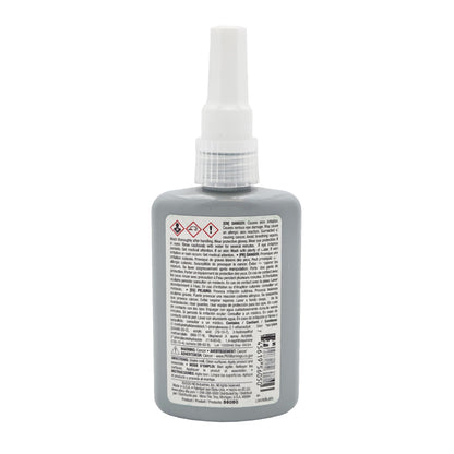 Back of Vibra-Tite 560 bottle showing danger warnings, hazard symbols, and barcode.