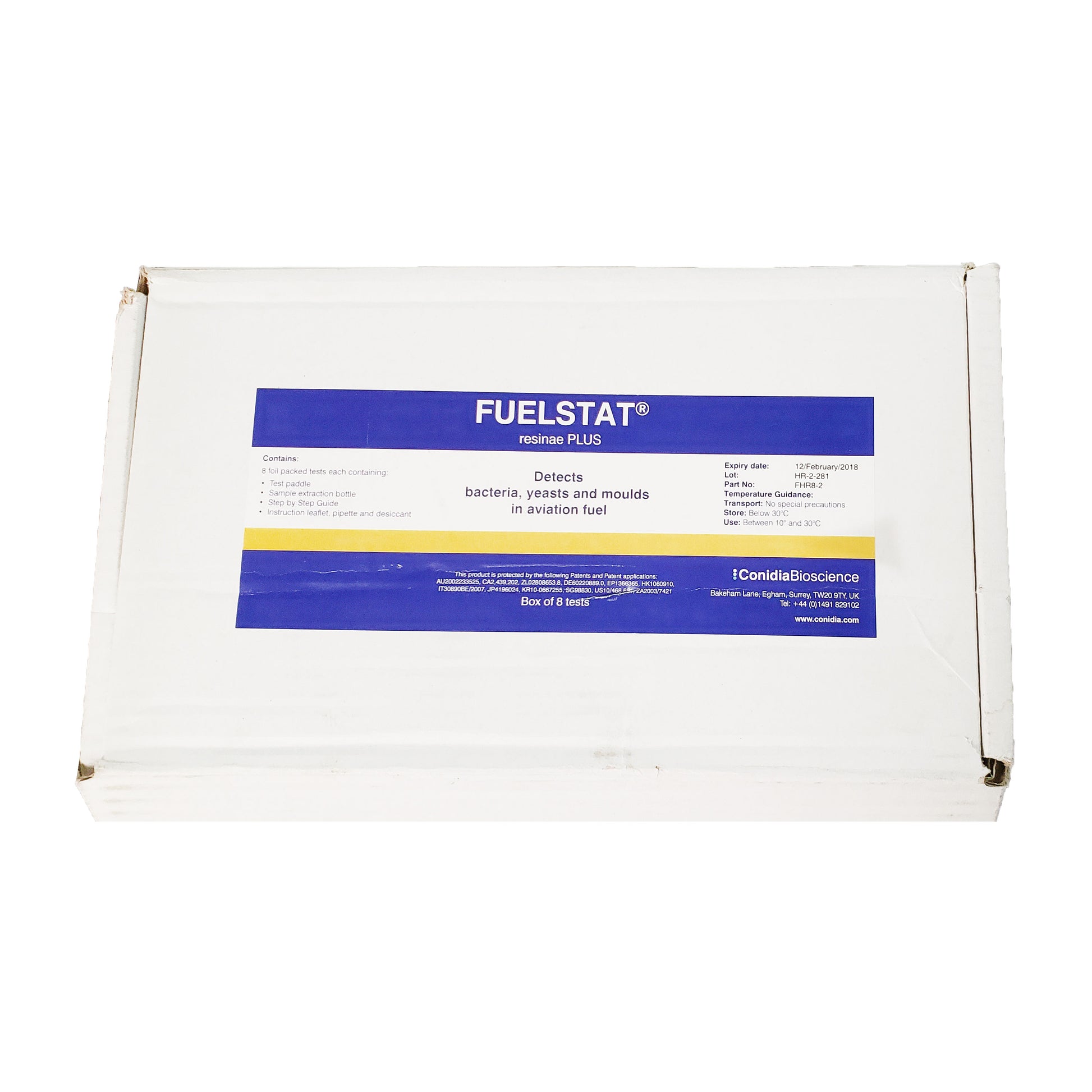 Empty silver foil pouch from expired FuelStat Resinae Plus aviation fuel test kit shown against white background.