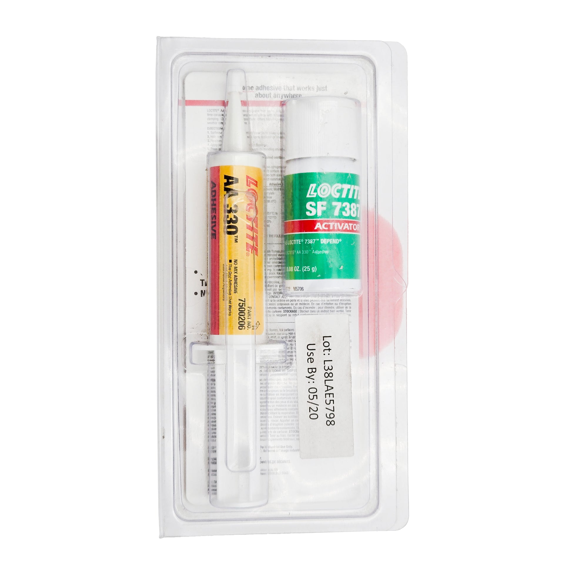 Front view of expired Loctite 330 Depend Adhesive 25mL kit sealed in clear blister pack showing syringe and activator bottle.