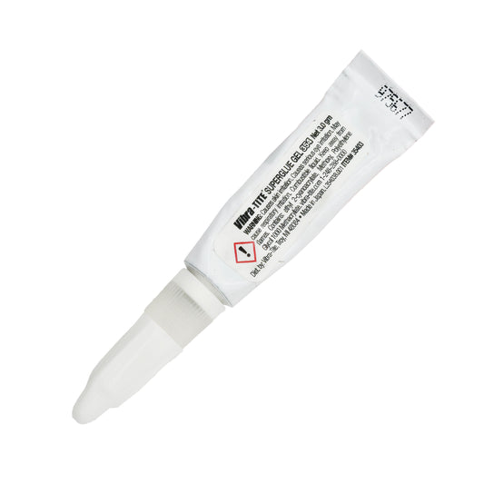 Front view of expired Vibra-Tite 354 Super Glue Gel 3g tube with white body, clear nozzle, and visible warning label text.