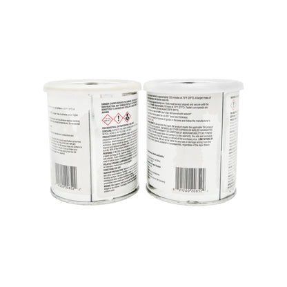 Side labels of 3M Scotch-Weld 2216 epoxy showing GHS hazard pictograms and danger statements for eye damage, skin irritation, and reproductive harm; industrial-use warning