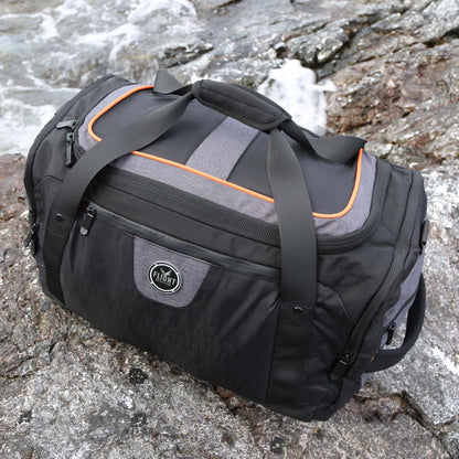 Flight Outfitters Crew Duffel Bag angled view on rocky surface